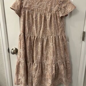 Tiered floral dress with beautiful stitching detail.